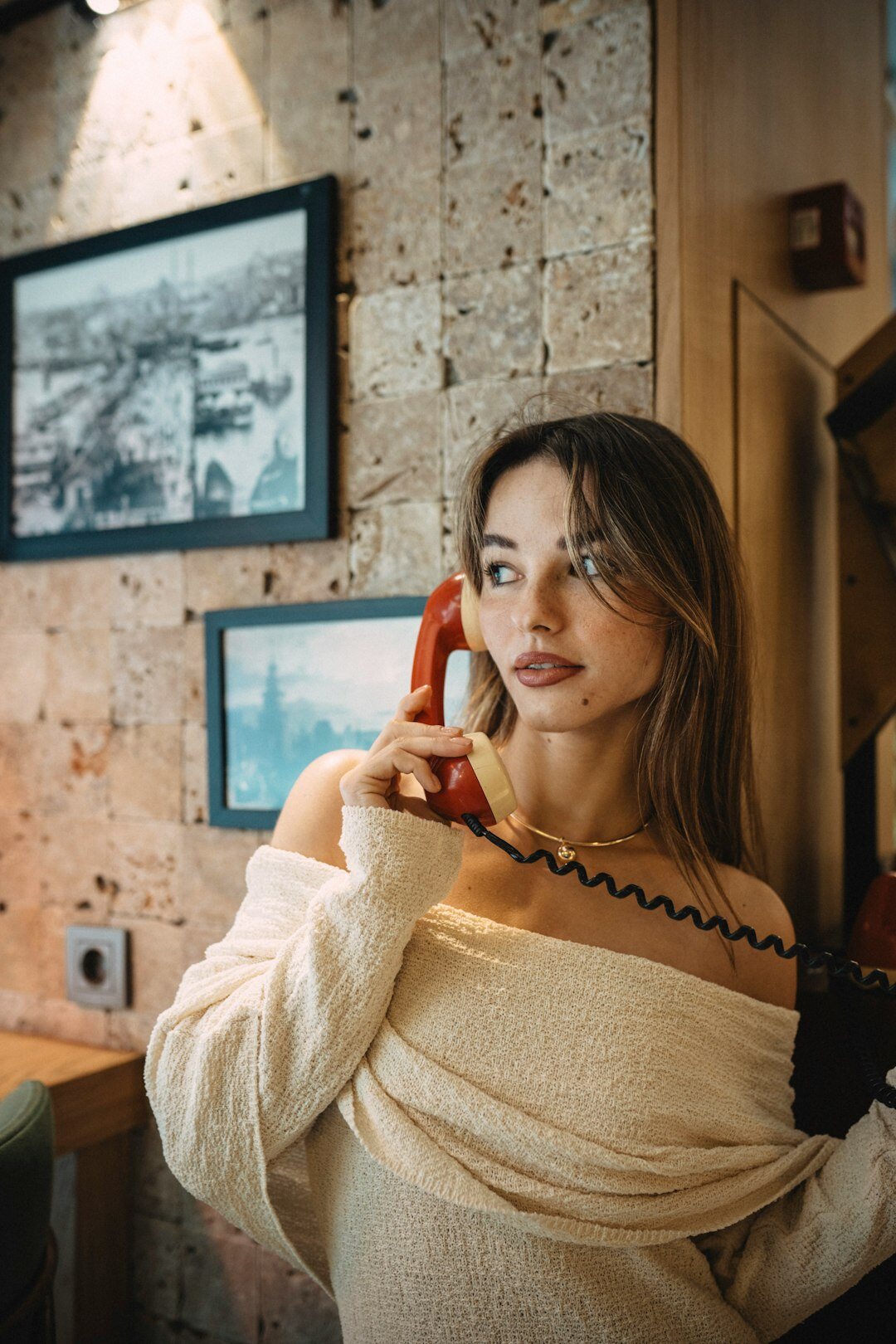 Swiss office employee answering a phone call at her desk