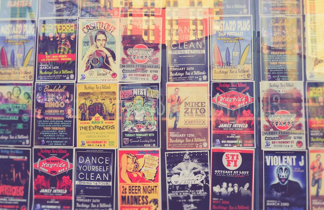 Wall covered with vintage advertising posters